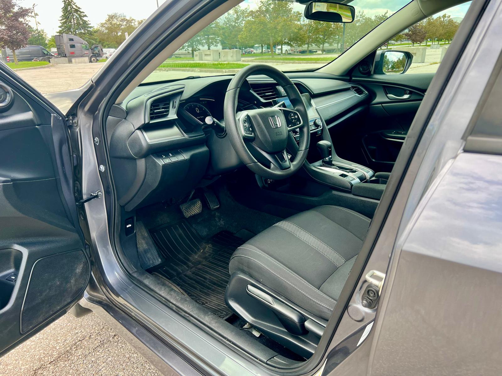 
								2020 Honda Civic LX full									